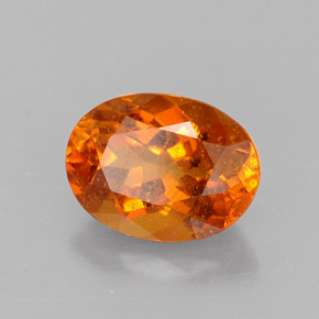 Clinoumite Giallo-arancione naturale da 1.43 ct, Taglio ovale, SI