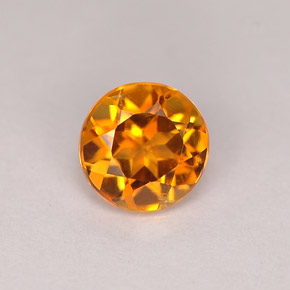 Clinoumite Giallo-arancione naturale da 0.71 ct, Taglio rotondo, VS