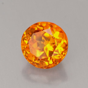 Clinoumite Giallo-arancione naturale da 0.89 ct, Taglio rotondo, VS-SI