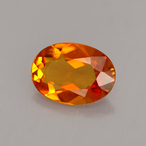 Clinohumite naturale arancione da 1,23 ct, taglio ovale, VS