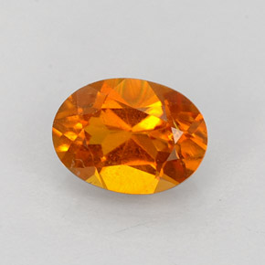 Clinoumite Giallo-arancione naturale da 0.84 ct, Taglio ovale, VS-SI