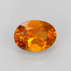 Clinoumite Giallo-arancione naturale da 0.84 ct, Taglio ovale, VS-SI