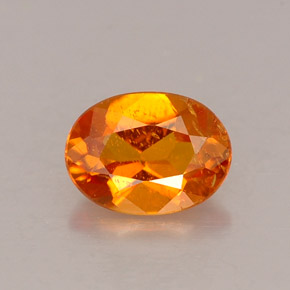 Clinohumite naturale arancione da 0,53 ct, taglio ovale, VS