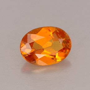 Clinohumite naturale arancione da 0,53 ct, taglio ovale, VS
