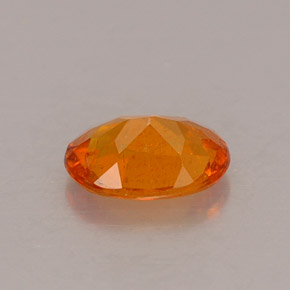 Clinohumite naturale arancione da 0,53 ct, taglio ovale, VS