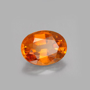 Clinoumite Giallo-arancione naturale da 1.47 ct, Taglio ovale, VS-SI