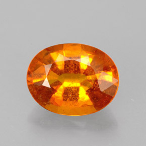 Clinoumite Giallo-arancione naturale da 1.46 ct, Taglio ovale, VS-SI