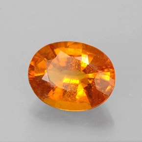 Clinoumite Giallo-arancione naturale da 1.46 ct, Taglio ovale, VS-SI