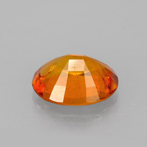 Clinoumite Giallo-arancione naturale da 1.46 ct, Taglio ovale, VS-SI