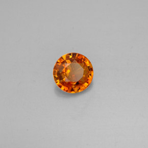 Clinoumite Giallo-arancione naturale da 0.63 ct, Taglio rotondo, VS-SI
