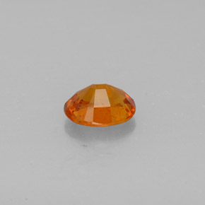 Clinohumite naturale arancione da 0,92 ct, taglio ovale, SI