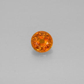 Clinoumite Giallo-arancione naturale da 0.64 ct, Taglio rotondo, SI