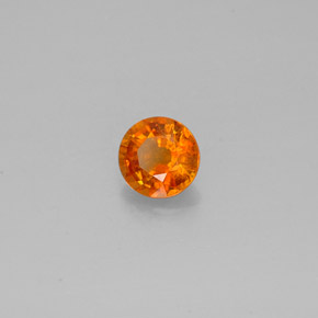 Clinoumite Giallo-arancione naturale da 0.64 ct, Taglio rotondo, SI