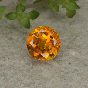 Clinoumite Giallo-arancione naturale da 0.62 ct, Taglio rotondo, VS-SI
