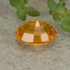 Clinohumite naturale arancione da 0,84 ct, taglio ovale, VS-SI