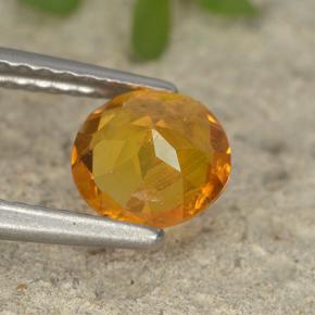 Clinoumite Giallo-arancione naturale da 0.87 ct, Taglio rotondo, VS-SI