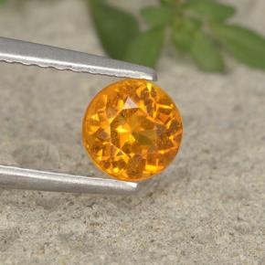Clinoumite Giallo-arancione naturale da 0.63 ct, Taglio rotondo, VS-SI