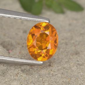 Clinohumite naturale arancione da 0,62 ct, taglio ovale, VS-SI