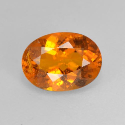 Clinohumite naturale arancione da 0,82 ct, taglio ovale, SI