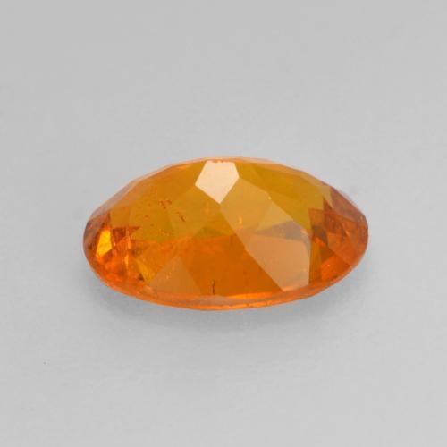Clinohumite naturale arancione da 0,82 ct, taglio ovale, SI