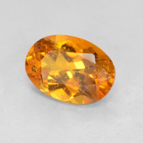 Clinohumite naturale arancione da 0,85 ct, taglio ovale, SI-I1