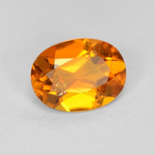 Clinoumite Arancione scuro naturale da 0.89 ct, Taglio ovale, SI