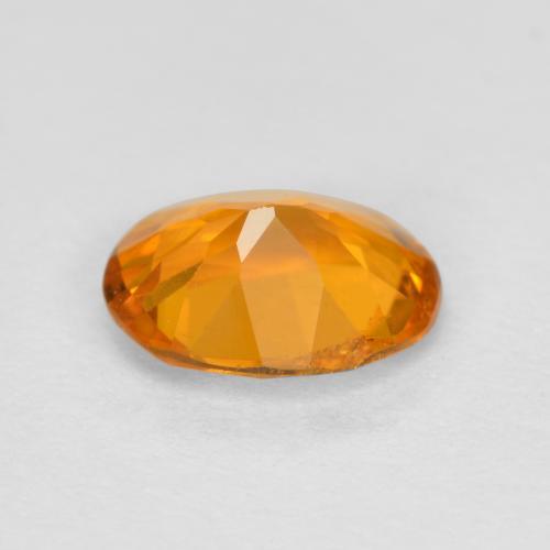 Clinohumite naturale arancione da 0,68 ct, taglio ovale, SI