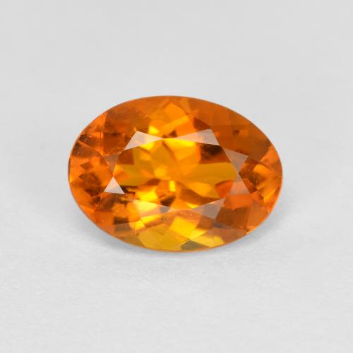 Clinoumite Arancio Medio naturale da 0.74 ct, Taglio ovale, SI