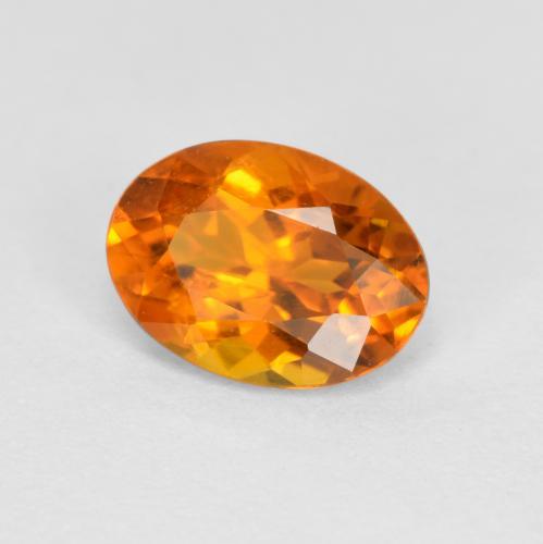 Clinoumite Arancio Medio naturale da 0.74 ct, Taglio ovale, SI