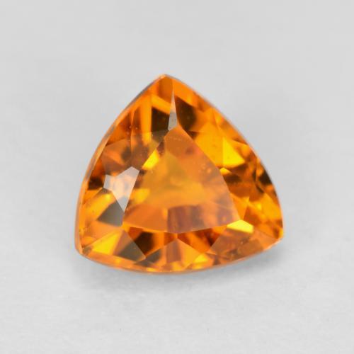 Clinohumite naturale arancione da 0,59 ct, trillion, VS