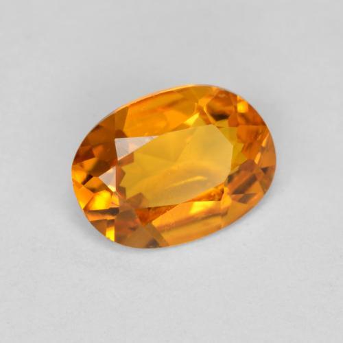 Clinohumite naturale arancione da 0,41 ct, taglio ovale, VS