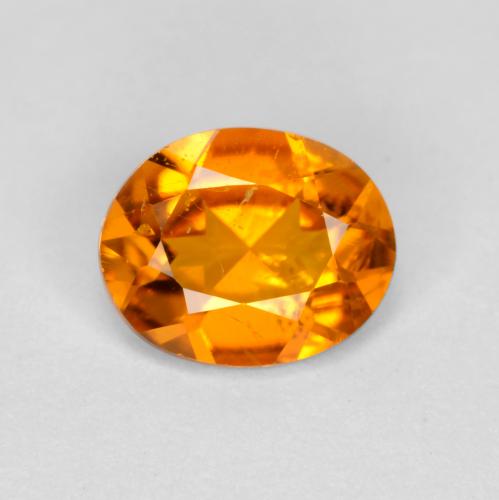 Clinohumite naturale arancione da 0,54 ct, taglio ovale, SI