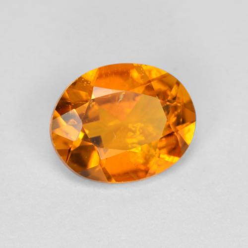 Clinohumite naturale arancione da 0,54 ct, taglio ovale, SI