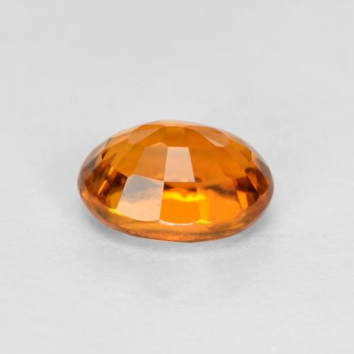 Clinoumite Albicocca Arancia naturale da 0.38 ct, Taglio ovale, VS