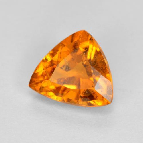 Clinohumite naturale arancione da 0,87 ct, trillion, SI