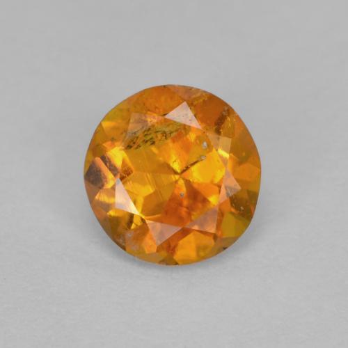Clinohumite arancio medio naturale da 0,63 ct, taglio rotondo, SI