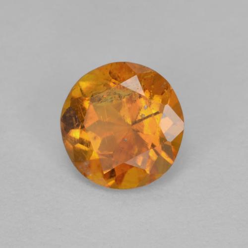 Clinohumite arancio medio naturale da 0,63 ct, taglio rotondo, SI