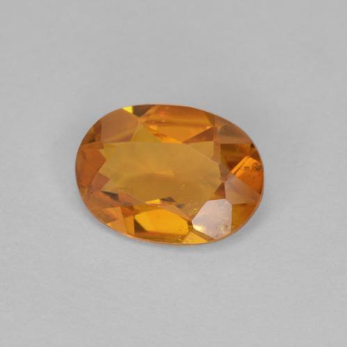 Clinohumite naturale arancione da 0,90 ct, taglio ovale, VS-SI