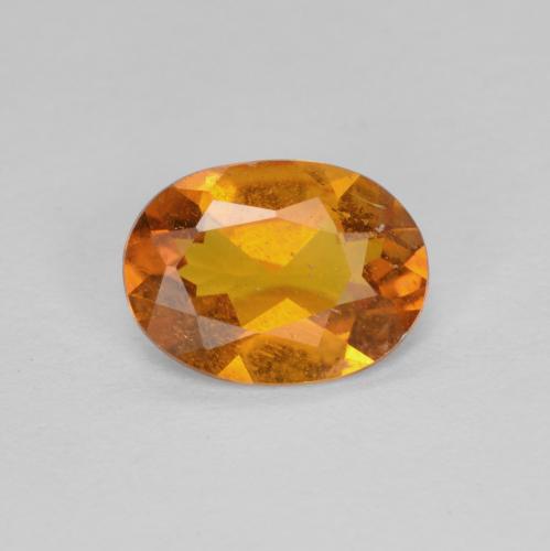 Clinohumite naturale arancione da 0,94 ct, taglio ovale, SI