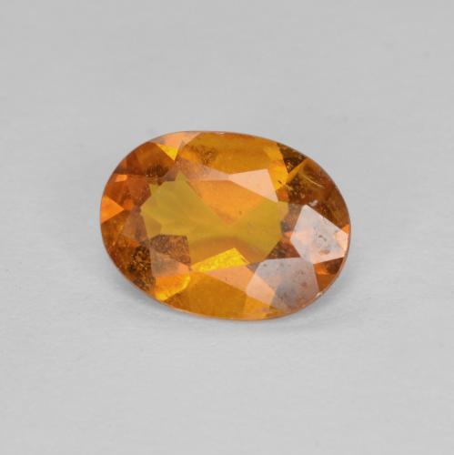 Clinohumite naturale arancione da 0,94 ct, taglio ovale, SI