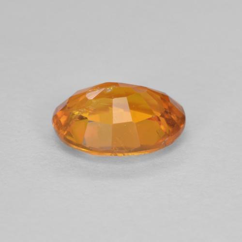 Clinohumite naturale arancione da 0,91 ct, taglio ovale, SI