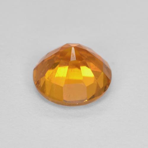 Clinoumite Arancio Medio naturale da 0.91 ct, Taglio rotondo, SI