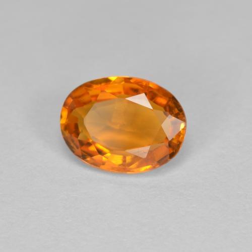 Clinoumite Arancio Medio naturale da 0.81 ct, Taglio ovale, VS-SI