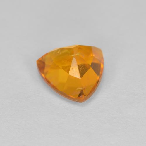 Clinohumite naturale arancione da 1,20 ct, trillion, SI