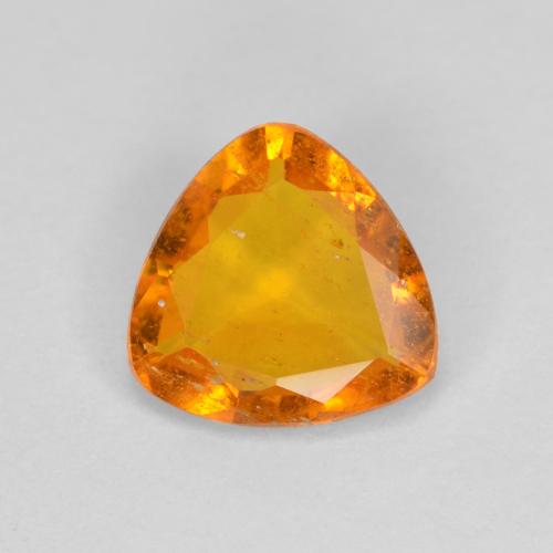 Clinoumite Arancione Ambra naturale da 0.83 ct, Taglio trillion, SI