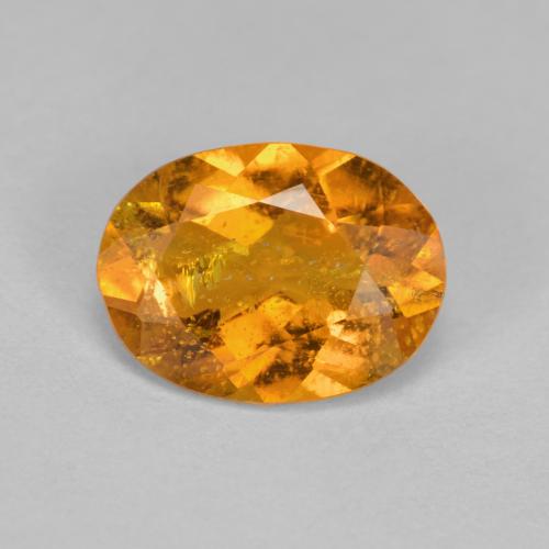 Clinohumite naturale arancione da 1,43 ct, taglio ovale, SI
