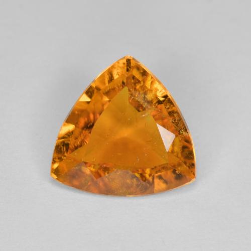 Clinohumite naturale arancione da 1,45 ct, trillion, SI