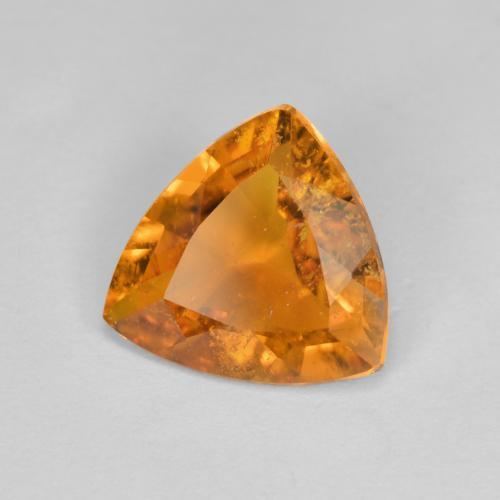 Clinohumite naturale arancione da 1,45 ct, trillion, SI