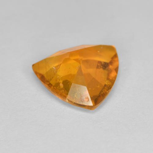 Clinohumite naturale arancione da 1,45 ct, trillion, SI