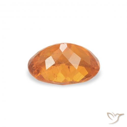 Clinoumite Arancione brillante naturale da 0.86 ct, Ovale, SI-I1